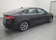2020 Ford Fusion in Houston, TX 77074 - 2315412 10